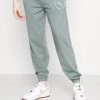 Budget ⌛ MENNACE ESSENTIAL REGULAR UNISEX - Jogginghose - Teal 👏